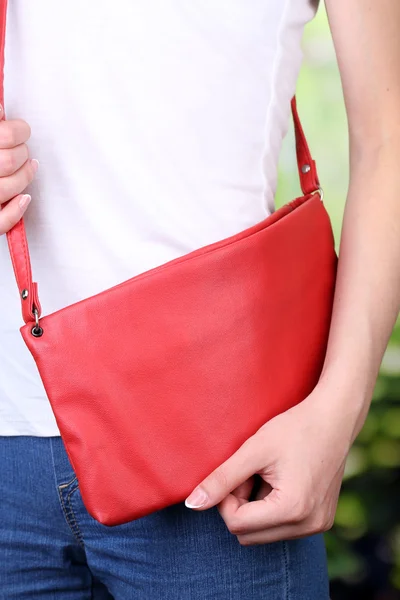 Girl with bag over her shoulder — Stock Photo, Image