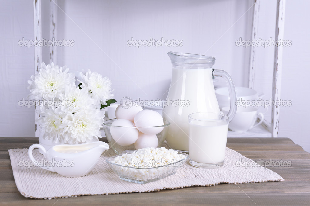Still life with tasty dairy products on table