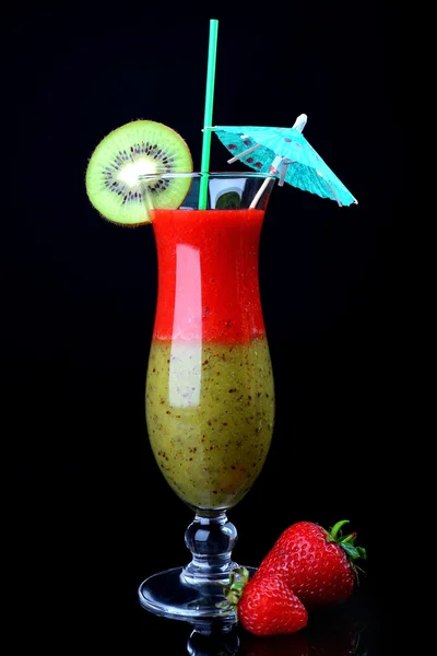 Delicious fruit smoothie on black background — Stock Photo, Image