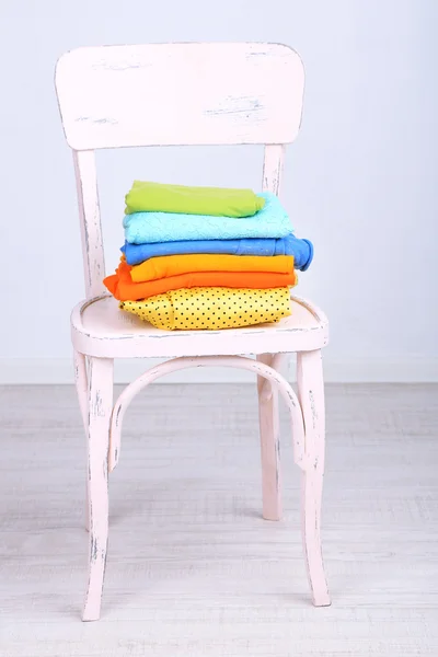 Clothes on chair — Stock Photo, Image