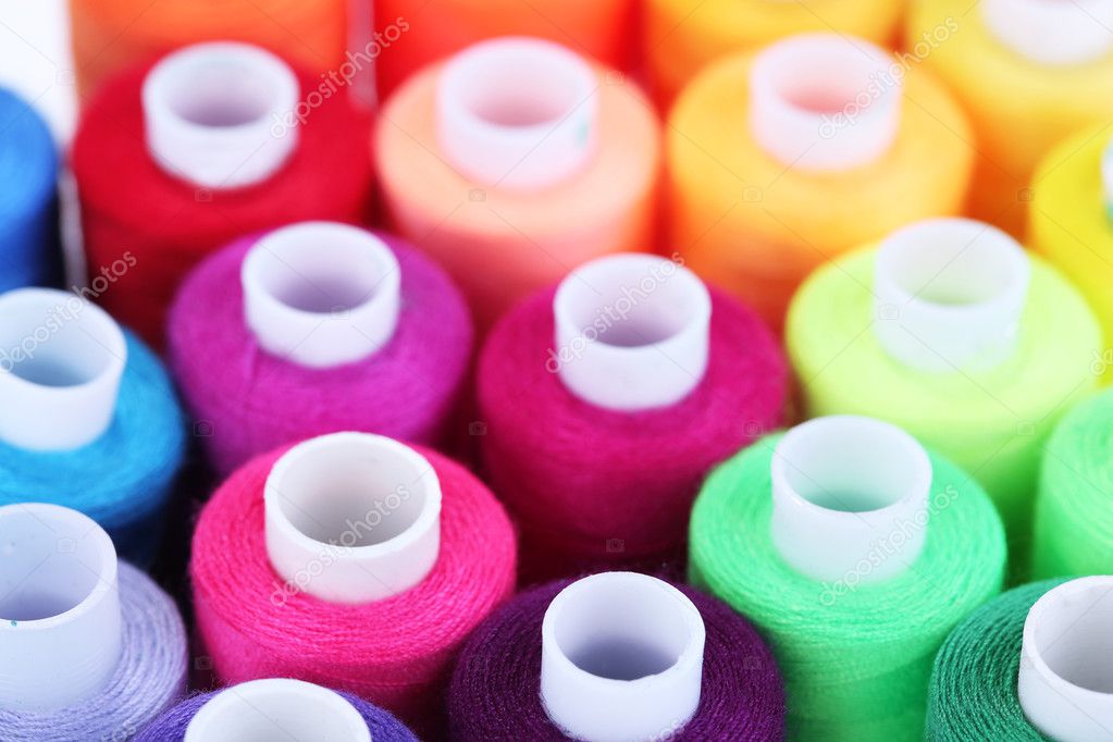 Multicolor sewing threads background