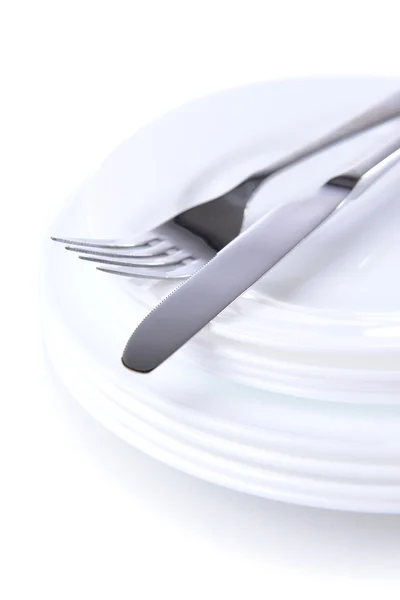 Set de platos blancos aislados sobre blanco — Foto de Stock