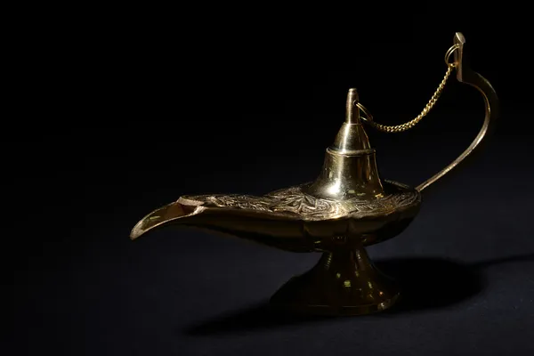 Magic lamp isolated on black — Stock Photo, Image