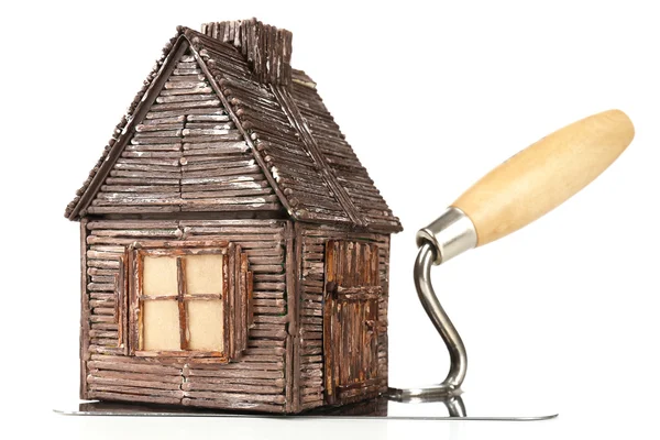 Trä leksak hus på murslev och kakel, isolerad på vit — Stockfoto
