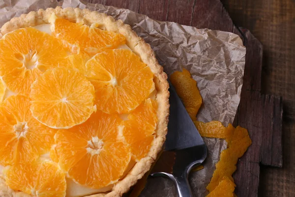 Homemade orange tart on wooden background — Stock Photo, Image