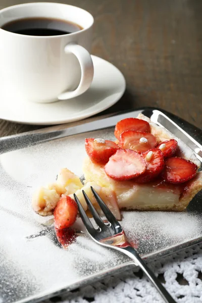 Piece of strawberry tart on  tray, on rustic wooden background — Stock Photo, Image