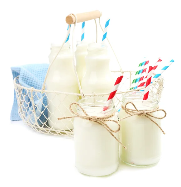 Milk in bottles with paper straws isolated on white — Stock Photo, Image