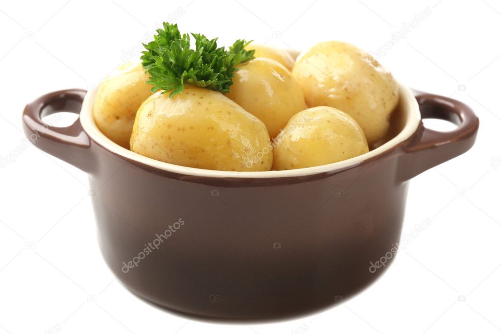 Young boiled potatoes in bowl, isolated on white