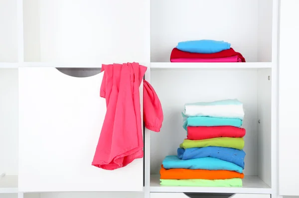 Clothes on shelves close-up — Stock Photo, Image