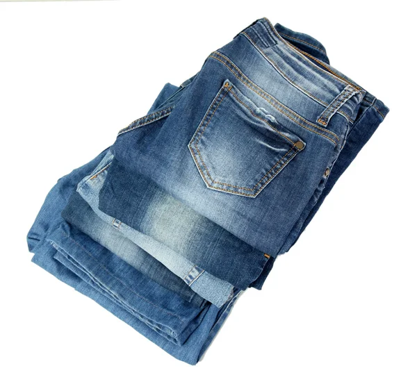 Lot of different blue jeans — Stock Photo, Image