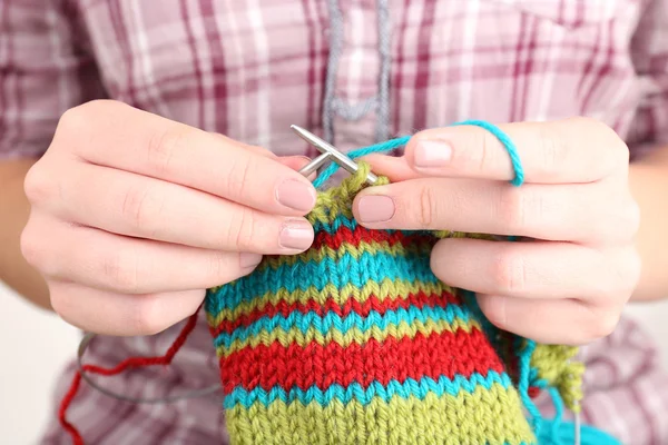 Female hands knitting with spokes — Stock Photo, Image