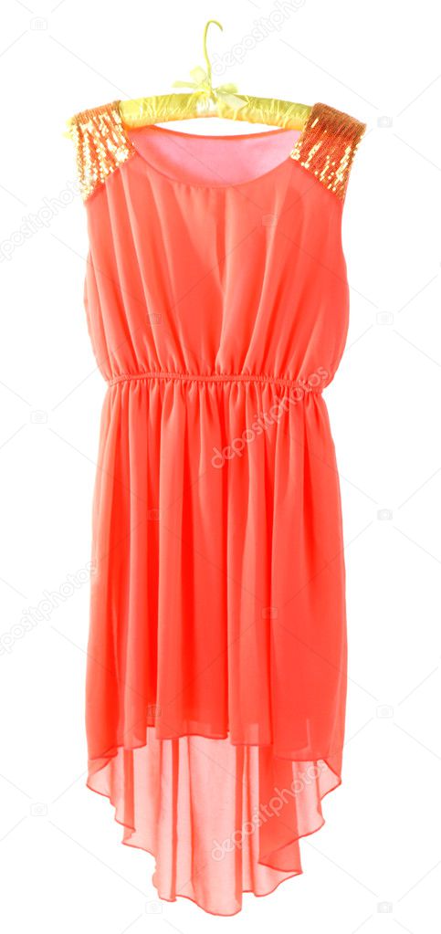 Beautiful coral dress hanging on hangers