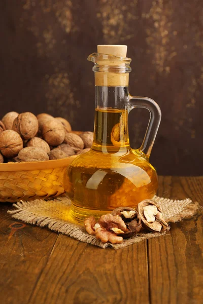 Walnut oil and nuts — Stock Photo, Image