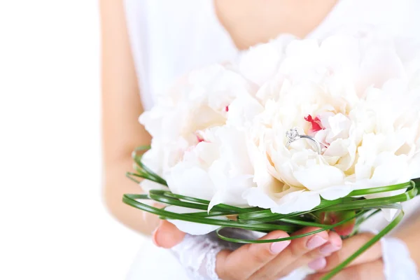 Bride holding wedding bouquet of white peonies — Stock Photo, Image