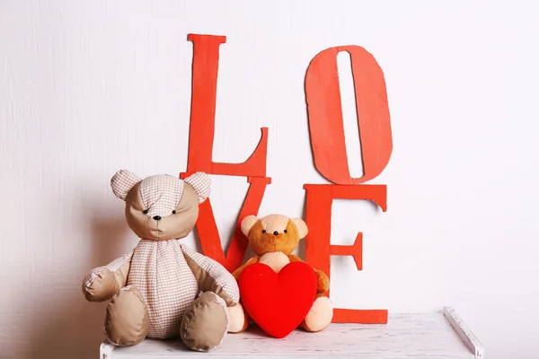 Decorative letters forming word LOVE with teddy bear — Stock Photo, Image