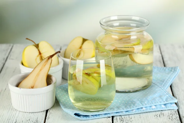 Sangria drink in glass and jar — Stock Photo, Image