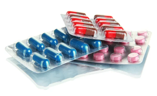 Капсулы и таблетки, упакованные в волдыри — стоковое фото