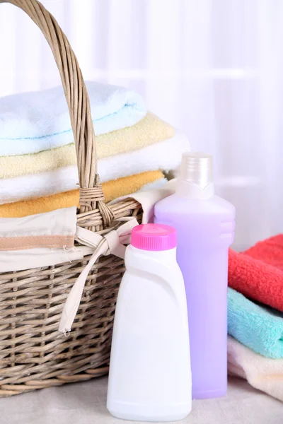 Colorful towels in basket — Stock Photo, Image