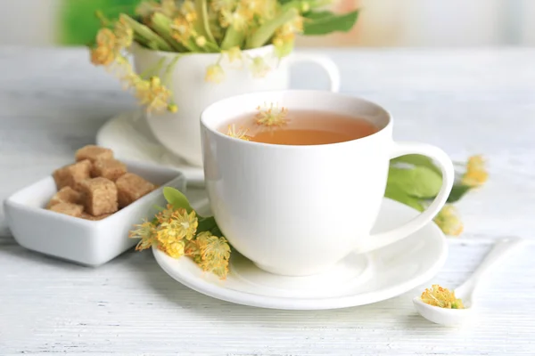 Tasty herbal tea with linden flowers — Stock Photo, Image