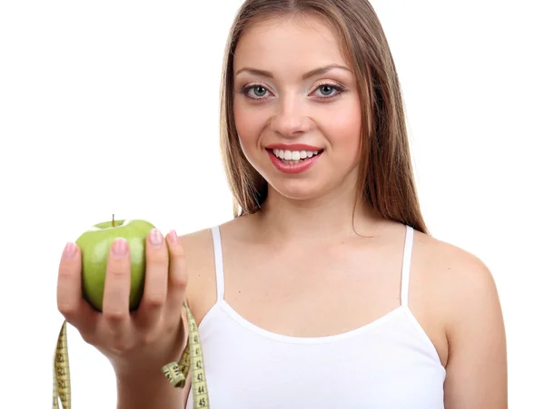Красивая девушка с яблоком и измерительной лентой — стоковое фото