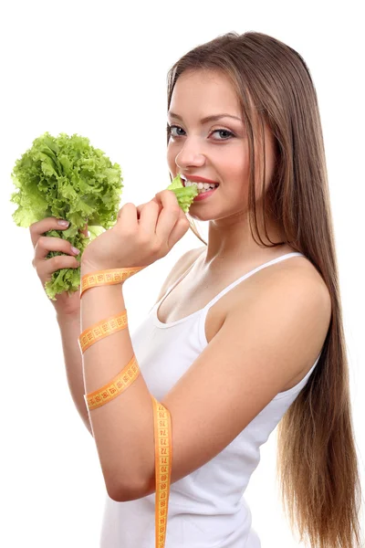 Hermosa chica con lechuga y cinta métrica — Foto de Stock