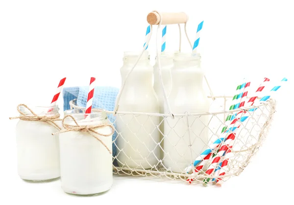 Leche en botellas con paja de papel aislada sobre blanco —  Fotos de Stock