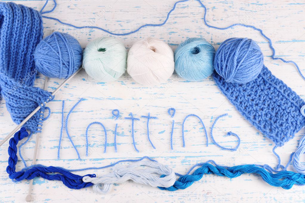 Yarns for knitting on wooden table