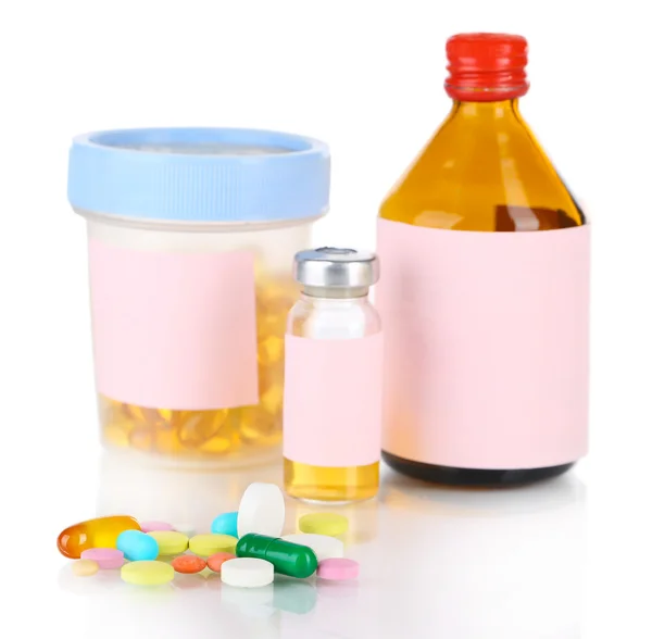 Comprimidos e frascos de medicamentos — Fotografia de Stock