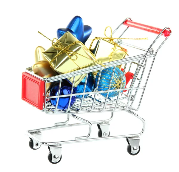 Christmas gifts in shopping trolley — Stock Photo, Image