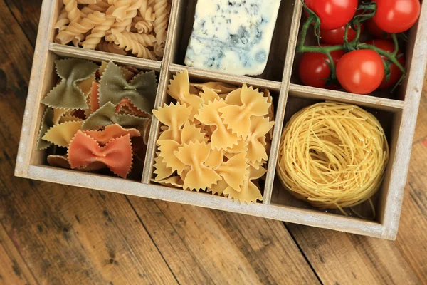 Italian products in wooden box — Stock Photo, Image