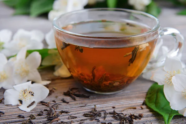 Csésze tea jasmine a táblázat — Stock Fotó