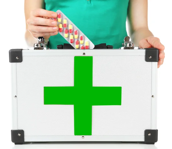 Woman holding first aid kit — Stock Photo, Image