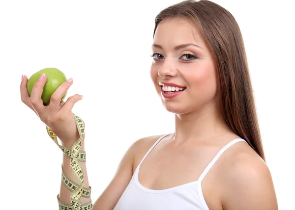 Beautiful girl with apple and measuring tape — Stock Photo, Image