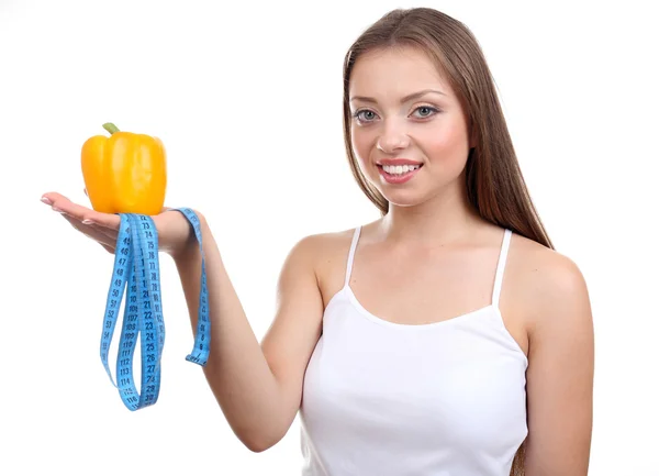 Beautiful girl with pepper and measuring tape — Stock Photo, Image