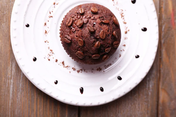 Muffin czekolady na płyty drewniane tła — Zdjęcie stockowe