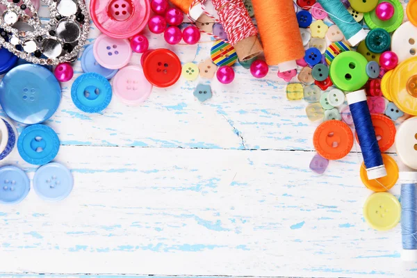 Sewing accessories on wooden table — Stock Photo, Image