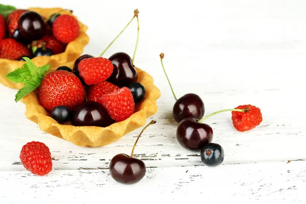Tasty tartlets with berries — Stock Photo, Image