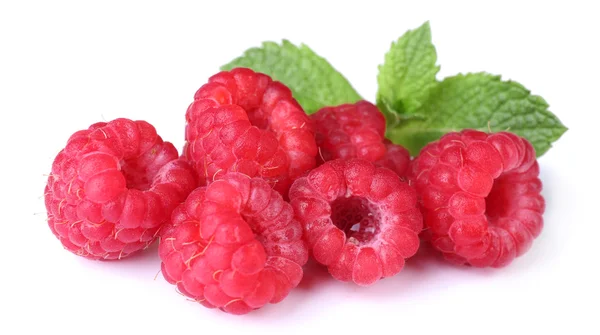 Ripe raspberries with mint leaf — Stock Photo, Image