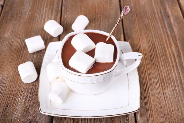 Cup of hot chocolate on table, close up Stock Photo