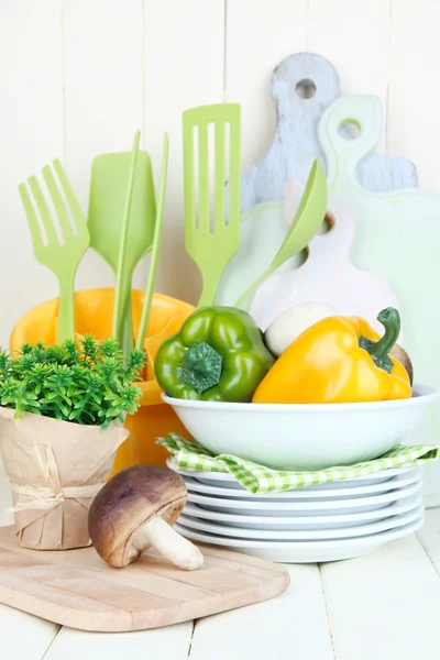Plastic kitchen utensils in cup — Stock Photo, Image
