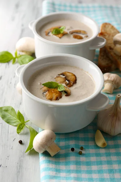 Mushroom soup in white pots — Stock Photo, Image