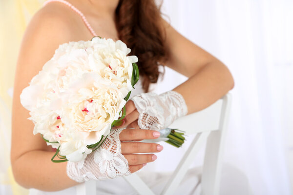 Bride holding wedding bouquet