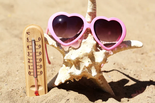 Thermometer in sand — Stock Photo, Image