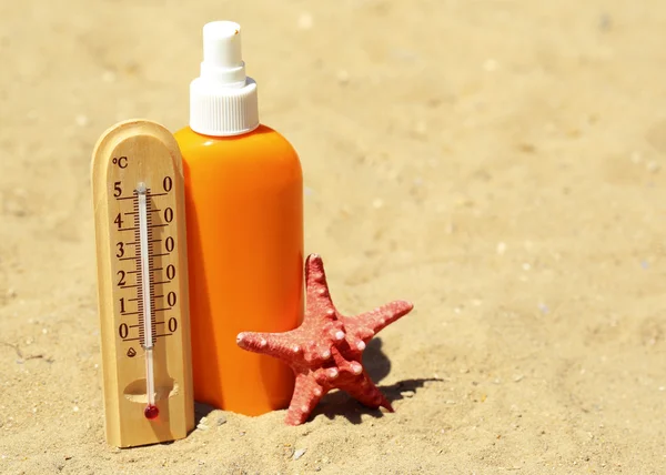 Thermometer in sand — Stock Photo, Image