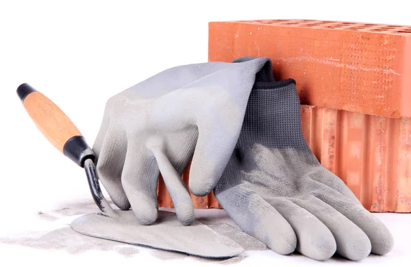 Rubber gloves and bricks — Stock Photo, Image