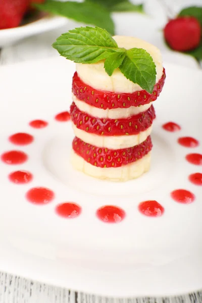 Strawberry with banana — Stock Photo, Image