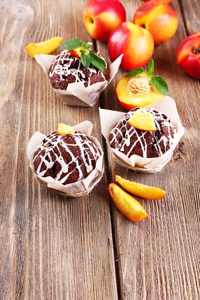 Cupcakes with peach — Stock Photo, Image