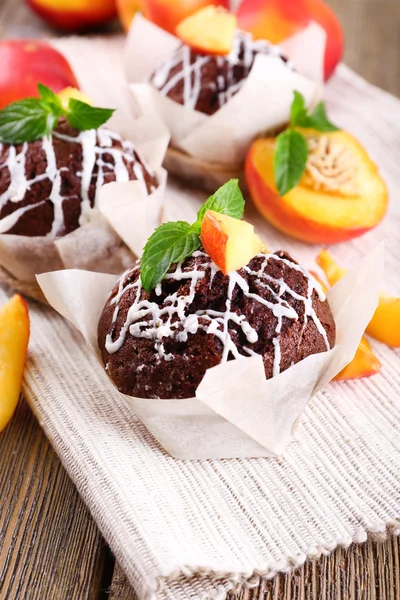 Cupcakes with peach — Stock Photo, Image