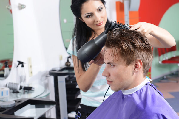 Young man in beauty salon