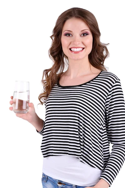 Красива молода дівчина п'є воду ізольовано на білому — стокове фото